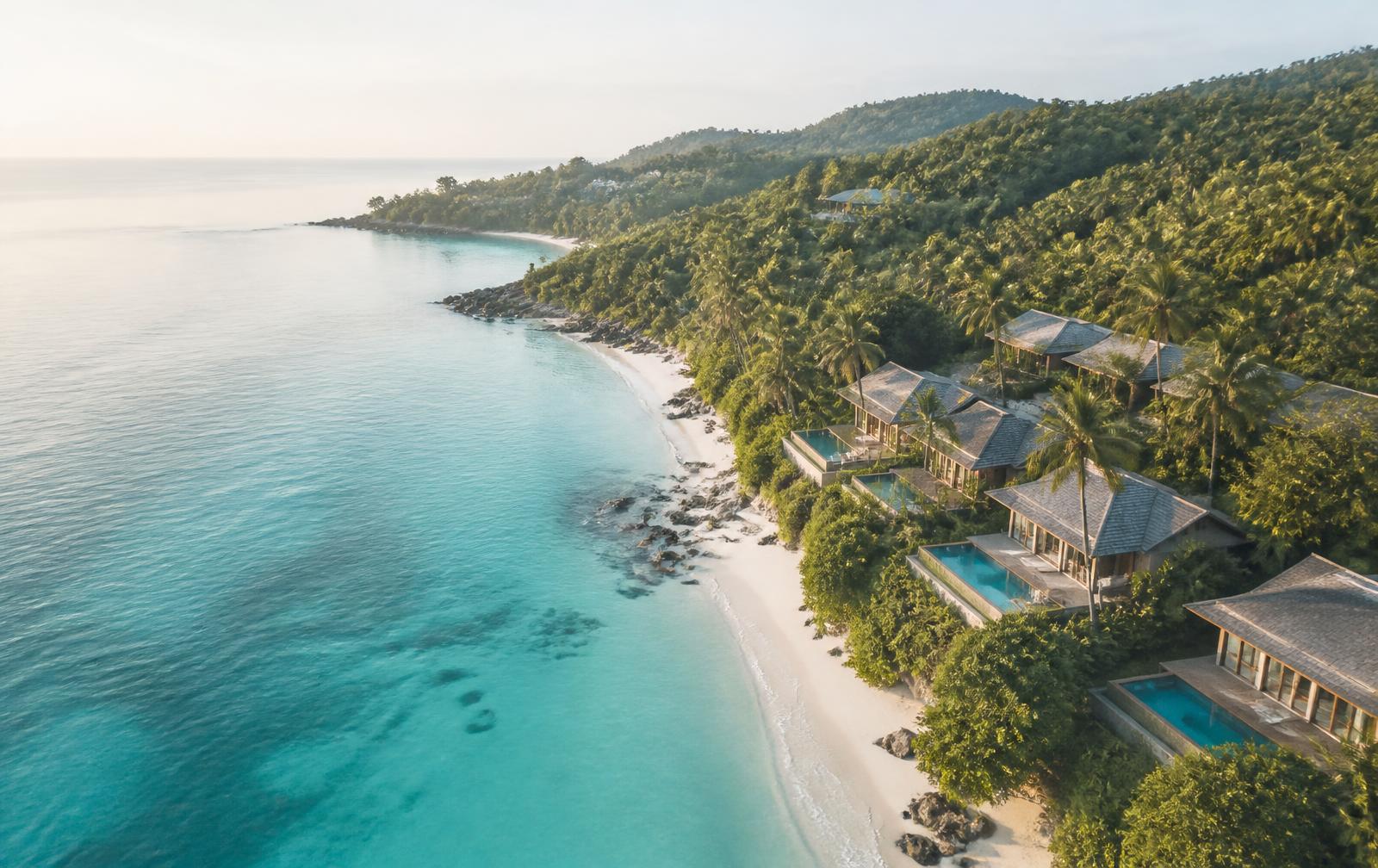 Aerial view of the Koh Samui coastline with villas